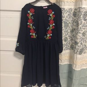 Girl’s navy long sleeved dress with flowers